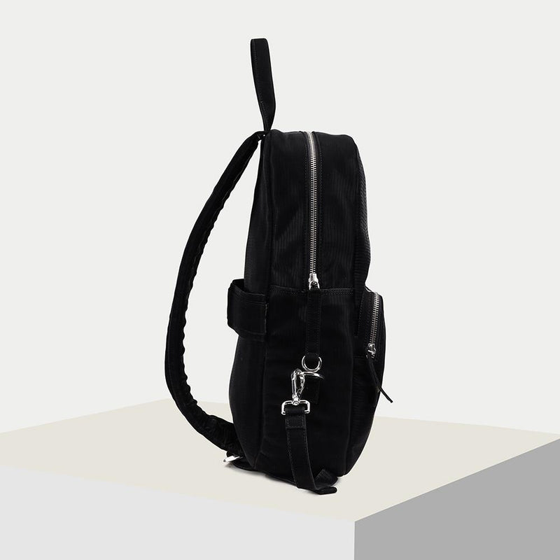 Two adjustable shoulder straps Vegan Leather Backpack