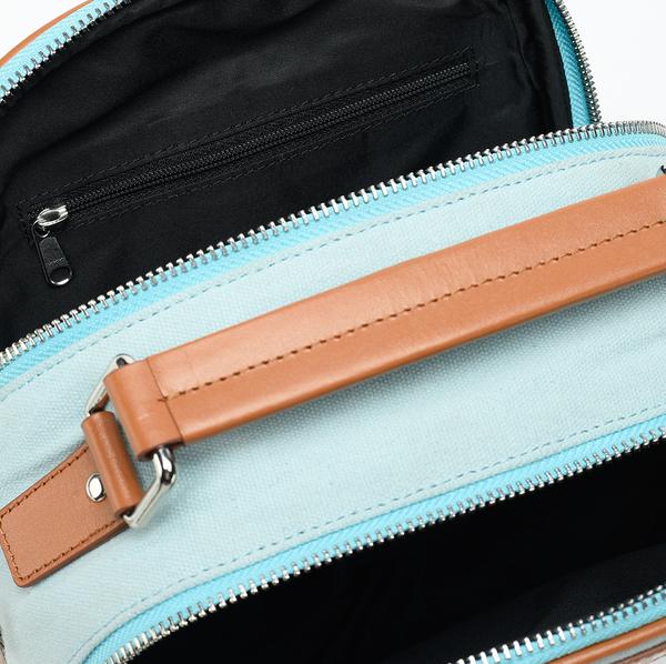 interior mobile pocket and a single zipper pocket Backpacks 
